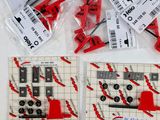 a lot of red and black construction tools on the table