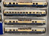 a stack of train cars that are stacked on top of each other