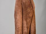 an image of a brown fur coat on a mannequin stand