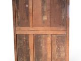 an old wooden cabinet that has been made into a bookcase