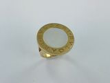 a gold plated ring with the word ' love ' engraved on it