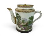 a tea pot that is sitting on a table