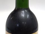 a bottle of wine that is sitting on a table