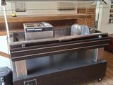 an image of a kitchen with a counter and a stove