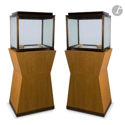 two wooden and glass display cases with a white background