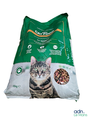 a bag of cat food sitting on a white surface