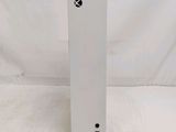 the back of a white nintendo wii game console sitting on top of a white table