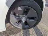 a close up of a tire on a car ' s rim
