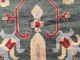 a close up of a rug with a design on it