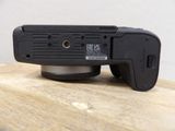 a camera that is sitting on a wooden table