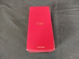 the red box is open on a black surface
