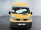 a yellow van that is parked in a room
