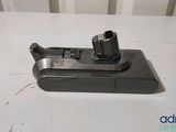 a close up of a cell phone charging dock on a table
