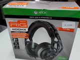 a close up of a box on a table with a pair of headphones