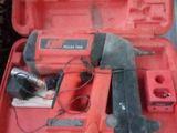 an image of a red tool case with tools inside of it