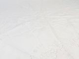a man riding a snowboard down a snow covered slope