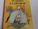 un vieux livre pour enfants avec l'image d'un homme sur un bateau