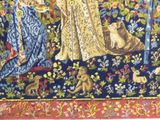 an image of a tapestry with a woman and a cat