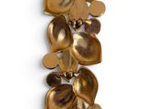 gold plated bracelet with flowers and leaves on a white background