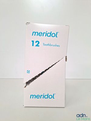 a box of toothbrushes sitting on a table