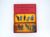 toy figurines in a red box on a white surface