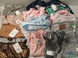 a box full of clothes that are sitting on a table