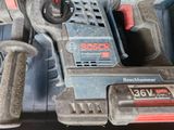 a cordless drill and a cordless hammer in a box