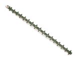 a close up of a bracelet with green stones on a white background