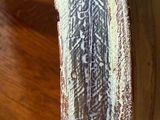 a close up of a piece of wood with a pattern on it