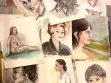 many pictures of a woman sitting on a table