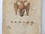 an old book with a picture of an eagle on it