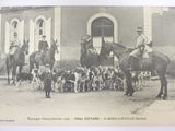 a lot of people that are riding horses in front of a building