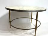 an image of a marble top coffee table with brass legs