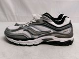 a close up of a pair of running shoes on a white surface