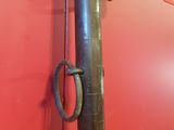 a large metal pipe with a metal ring on it