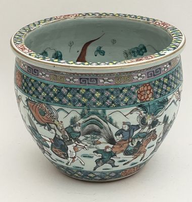 a blue and white bowl with a design on it