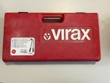 a red box with a sticker on it sitting on a table
