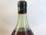a bottle of liquid that is sitting on a table
