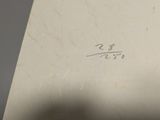 someone is writing on a piece of paper with a pencil