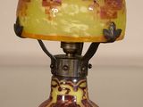 a lamp that is sitting on a glass table
