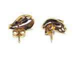 two pairs of gold tone earrings with black and white designs
