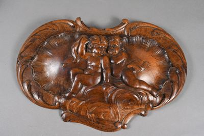 a wooden plaque with a picture of a woman and a child