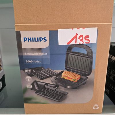 packaging of a sandwich maker on display in a store