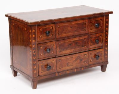 an image of a wooden chest of drawers with drawers