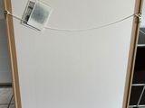 a picture of a white refrigerator in a kitchen