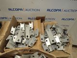 many pieces of metal in a box on the floor
