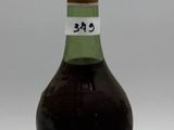 a bottle of liquor that is sitting on a table