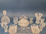 a lot of glass items that are sitting on a table