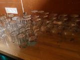 a lot of empty glasses on the table