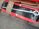 a red box with a wren and a pair of wrenches in it